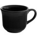 A Tuxton black china coffee cup with a black handle.