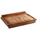 A Fox Run reversible wooden pastry board on a table.