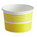 A yellow paper Choice frozen yogurt cup with yellow and white stripes.