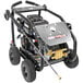 A black and silver Simpson gas powered pressure washer with wheels.