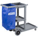 A caribou® janitorial cart with a blue Carlisle nylon bag.