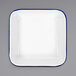 A white square enamelware tray with a blue rim.
