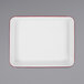A white rectangular tray with red trim.