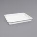 A white rectangular Crow Canyon Home enamelware tray with a grey rim.