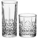 Two Acopa Gardenia glasses with a patterned design.