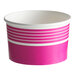 A pink paper cup with white stripes.