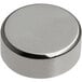 A round silver magnet with a white background.