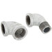 A close-up of two metal pipe fittings.