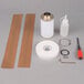 A white cylinder filter kit for a VacPak-It VMC20FGF vacuum packaging machine.