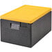 A black plastic Cambro food pan carrier with a yellow lid.
