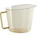 A clear plastic Cambro measuring cup with a gold handle.