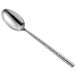 A Carlisle Terra stainless steel serving spoon with a textured handle.