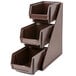 A brown plastic organizer with three compartments on a three-tier stand.