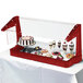 A red Cambro buffet and salad bar display case with food on it.