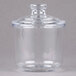 A clear Cambro Camwear condiment jar with a slotted lid.