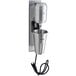 A silver AvaMix wall mount drink mixer with a black cord.