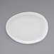 A white Front of the House Tides oval porcelain plate.