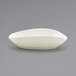 A white oval Front of the House Tides ramekin.