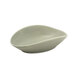 A Front of the House Tides semi-matte oval porcelain ramekin with curved edges.