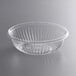 A Dart C24B clear plastic bowl with a ribbed bottom.
