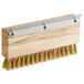 A Carlisle wooden brush head with metal bristles for a pizza oven.