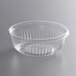 A Dart C12B clear plastic bowl with a ribbed bottom.