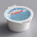 A white Smithfield Light Cream Cheese container with a blue label.