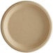 A round beige Tellus Products bagasse plate.