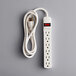 A close-up of a white Voltec power strip with a red plug.