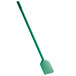 A green spade with a long handle.