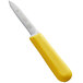 A yellow Dexter-Russell paring knife with a white handle.