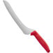 A Dexter-Russell bread knife with a red handle.