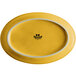 A yellow oval china platter with a white border.