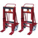 Two red Wesco machinery movers with wheels.