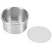 A Baker's Mark aluminum mini cheesecake pan with a removable bottom on a white plate.