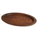 A Valor oval rubberwood underliner with a curved edge.