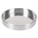 A round silver aluminum Baker's Mark cheesecake pan with a removable bottom.