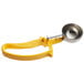 A yellow Thunder Group EZ Grip Squeeze Disher with a silver metal handle.