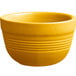 An Acopa Capri mango orange stoneware bouillon bowl with a handle on a white background.