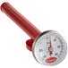 A red thermometer with a metal handle and a gauge.