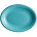 An oval Caribbean turquoise stoneware platter with a rim.