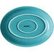 An oval Caribbean turquoise stoneware platter with a white border and the word "moka" in white.