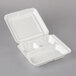 A white Dart foam container with three compartments.