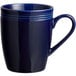 An Acopa Capri deep sea cobalt stoneware mug with a handle and a stripe.