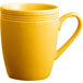 An Acopa Capri mango orange stoneware mug with a handle on a white background.