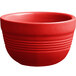 An Acopa Capri bouillon bowl in passion fruit red stoneware with a handle.