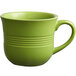 An Acopa Capri green stoneware cup with a handle.