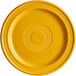 A close up of a mango orange Acopa Capri stoneware plate with a circular pattern in the center.