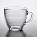 A clear glass Duralex mug with a handle.