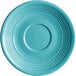 A close-up of an Acopa Capri Caribbean turquoise stoneware saucer with a circular pattern and rim.
